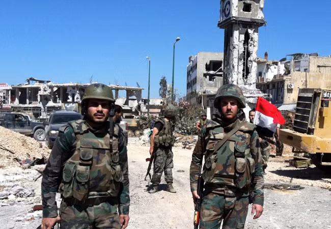 Binh sĩ quân đội Syria trên chiến trường miền Tây Nam Aleppo