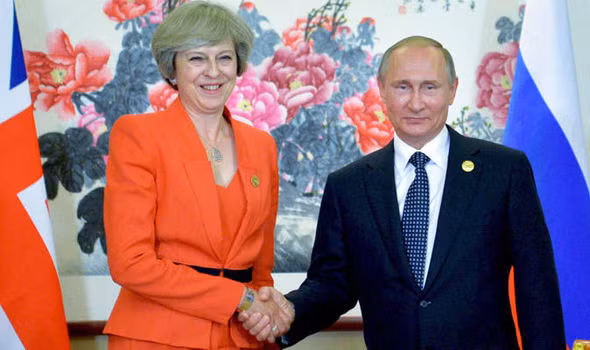 Thủ tướng Anh Theresa May và Tổng thống Nga Putin.