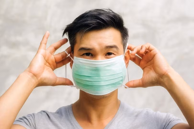 Đeo khẩu trang đúng cách (Ảnh - MH)