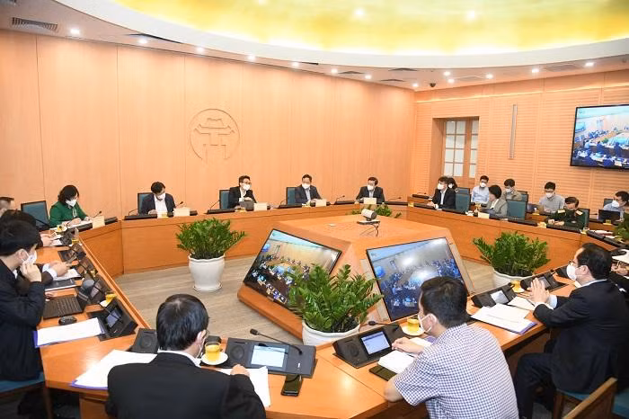 Toàn cảnh buổi làm việc của Phó Thủ tướng Chính phủ Vũ Đức Đam trong buổi làm việc với TP. Hà Nội về công tác phòng, chống dịch COVID-19 (Ảnh - Trọng Toàn)